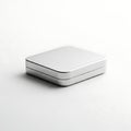 Minimalist silver tin box packaging mockup on a white background studio shot Royalty Free Stock Photo