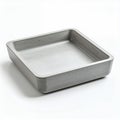 Minimalist square concrete tray casting shadow, contemporary design object on white background Royalty Free Stock Photo