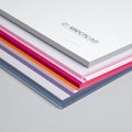 Minimalist Stack of Colored Edge Paper Samples Royalty Free Stock Photo