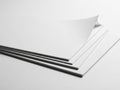 Minimalist stack of white paper sheets on a clean surface Royalty Free Stock Photo