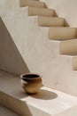 Minimalist stairs with rustic pottery, suitable for interior design inspiration, AI Generated Royalty Free Stock Photo