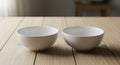 Two White Bowls on Wooden Table Royalty Free Stock Photo