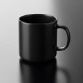 Simple black coffee mug with handle studio shot Royalty Free Stock Photo