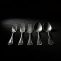 Elegant Silverware on Black Background Royalty Free Stock Photo
