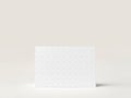 A minimalist studio shot of a rectangular white box against a neutral background with soft lighting setup Royalty Free Stock Photo