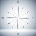 A minimalist, stylized compass rose features Royalty Free Stock Photo
