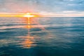 Minimalist sunset over calm ocean water. Royalty Free Stock Photo