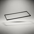 Three-dimensional black rectangular frame is suspended in midair against a Royalty Free Stock Photo