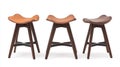 Minimalist Trio Three Wooden Stools Against a Textured Background Emphasizing Simplicity and Functional Design Royalty Free Stock Photo