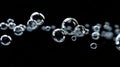 Minimalist Underwater Shot of Bubbles Rising in Dark Background Royalty Free Stock Photo