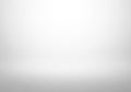 A minimalist white background with a subtle gradient. The surface Royalty Free Stock Photo