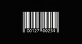 Minimalist White Barcode Graphic with Numbers on a Solid Black Background for Retail and Commerce Concepts Royalty Free Stock Photo