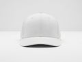 Minimalist white baseball cap on plain background Royalty Free Stock Photo
