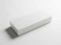 Minimalist white box casts soft shadow on plain surface Royalty Free Stock Photo