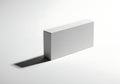 Minimalist white box with dramatic shadow on white background Royalty Free Stock Photo