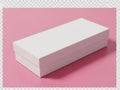 Minimalist white box on a soft pink background Royalty Free Stock Photo