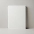 Minimalist white box standing against a plain light grey wall Royalty Free Stock Photo