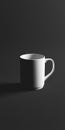 Minimalist White Ceramic Mug on Dark Background with Dramatic Lighting Royalty Free Stock Photo