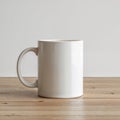 Minimalist White Ceramic Mug on Wooden Table Royalty Free Stock Photo