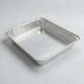 Minimalist white ceramic square baking dish for culinary presentation projects studio shot Royalty Free Stock Photo