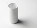 Minimalist white cylindrical object on a plain background Royalty Free Stock Photo