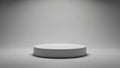 Minimalist white cylindrical podium with soft spotlight illumination against a gradient gray studio background Royalty Free Stock Photo