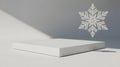 Minimalist White Pedestal with Hanging Snowflake and Shadow Play Royalty Free Stock Photo