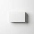 A minimalist white rectangular object casting a shadow on a plain background Royalty Free Stock Photo