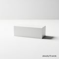Minimalist white rectangular object casting a shadow on a plain background Royalty Free Stock Photo