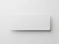 Minimalist white rectangular object with a curved edge on a plain background Royalty Free Stock Photo