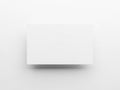 A minimalist white rectangular object with a subtle shadow on a plain background Royalty Free Stock Photo