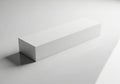 A minimalist white rectangular prism casting a shadow on a white background isolated on white background Royalty Free Stock Photo