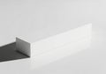 Minimalist white rectangular prism casting a shadow isolated on white background Royalty Free Stock Photo