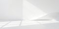 A minimalist white room with a large window casting a beam of light and a subtle shadow on the floor and wall Royalty Free Stock Photo