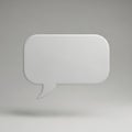 A minimalist white speech bubble on a gray background Royalty Free Stock Photo