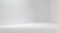 Minimalist White Studio Corner with Textured Wall and Soft Light Royalty Free Stock Photo