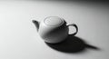 Minimalist White Teapot with Dramatic Shadow on Textured Surface Royalty Free Stock Photo