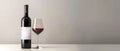 Minimalist wine bottle and glass mock up, white label, on a clean canvas for drink promotion Royalty Free Stock Photo