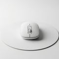 Minimalist wireless mouse on circular pad Royalty Free Stock Photo