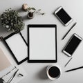 Flatlay of minimalist work desk with tablet and pens - 1