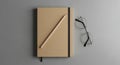 Minimalist Workspace Composition with Notebook Glasses and Pencil for Productivity and Creative Projects Royalty Free Stock Photo