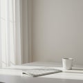 A minimalist workspace features a white desk with a sleek wireless keyboard and a plain white mug