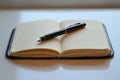 A minimalist workspace featuring desk with notebook and pen for focused writing Royalty Free Stock Photo
