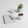 Minimalist workspace setup on a white surface. Includes a close Royalty Free Stock Photo
