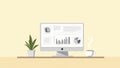 Minimalist Workspace with Sleek Computer and Green Plant