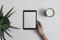 Minimalist Workspace: Tablet, Plant, and Coffee Royalty Free Stock Photo