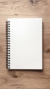 Minimalist workspace Top view of a notebook on wooden flooring