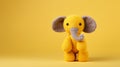 Minimalist Yellow Crochet Elephant On A Colorful Background