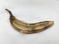 Minimalistic abstract composition on a white background. The peel of a ripe banana.