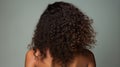 Minimalistic Back View of African American Woman with Brown Curly Hair AI Generated